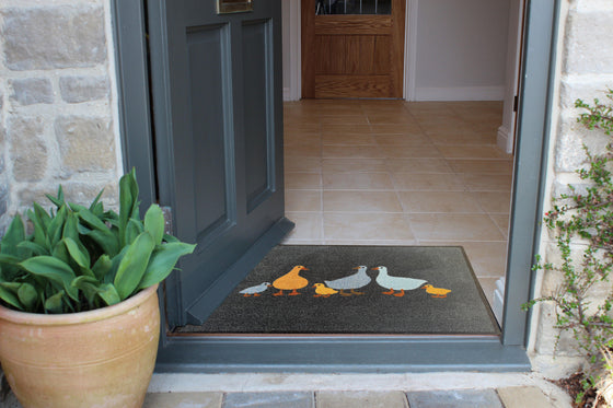 Goose family recycled doormat