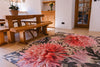 Atlantic Mats recycled rug with red chrysanthemum floral design in a rustic dining room