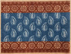 Atlantic Mats Woodblock Paisley Curious Collection Ocean Mat in blue and rust brown